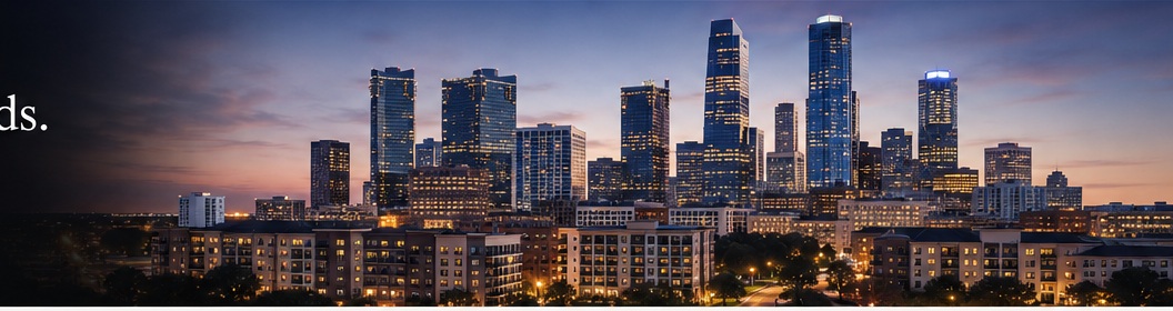 City skyline and multifamily buildings at dusk